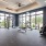 second floor gym with large windows