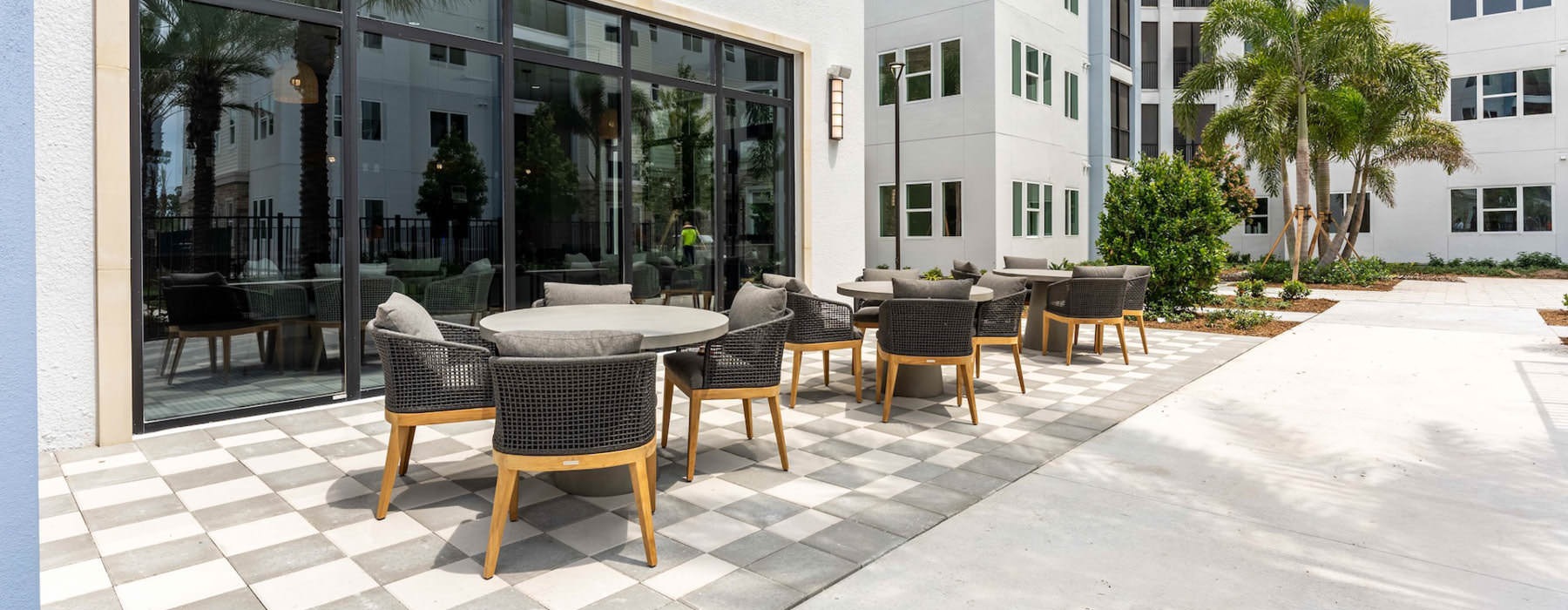outdoor patio with tables and chairs